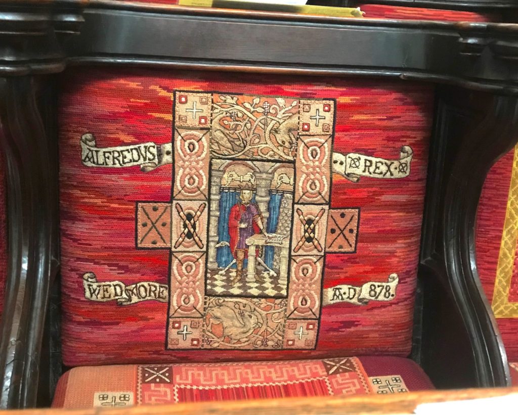 Wells Cathedral, Somerset. Seat cover commemorating King Alfred's presence at Wedmore in 878