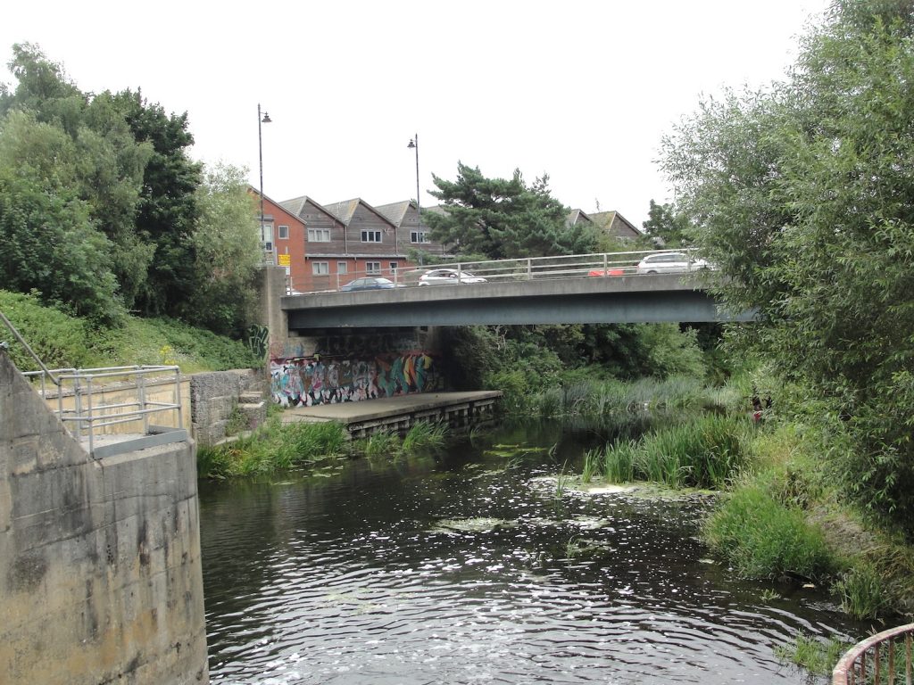 Chippenham, Wiltshire. Looking across to the east bank of the River Avon (the bridge is Gladstone Road)