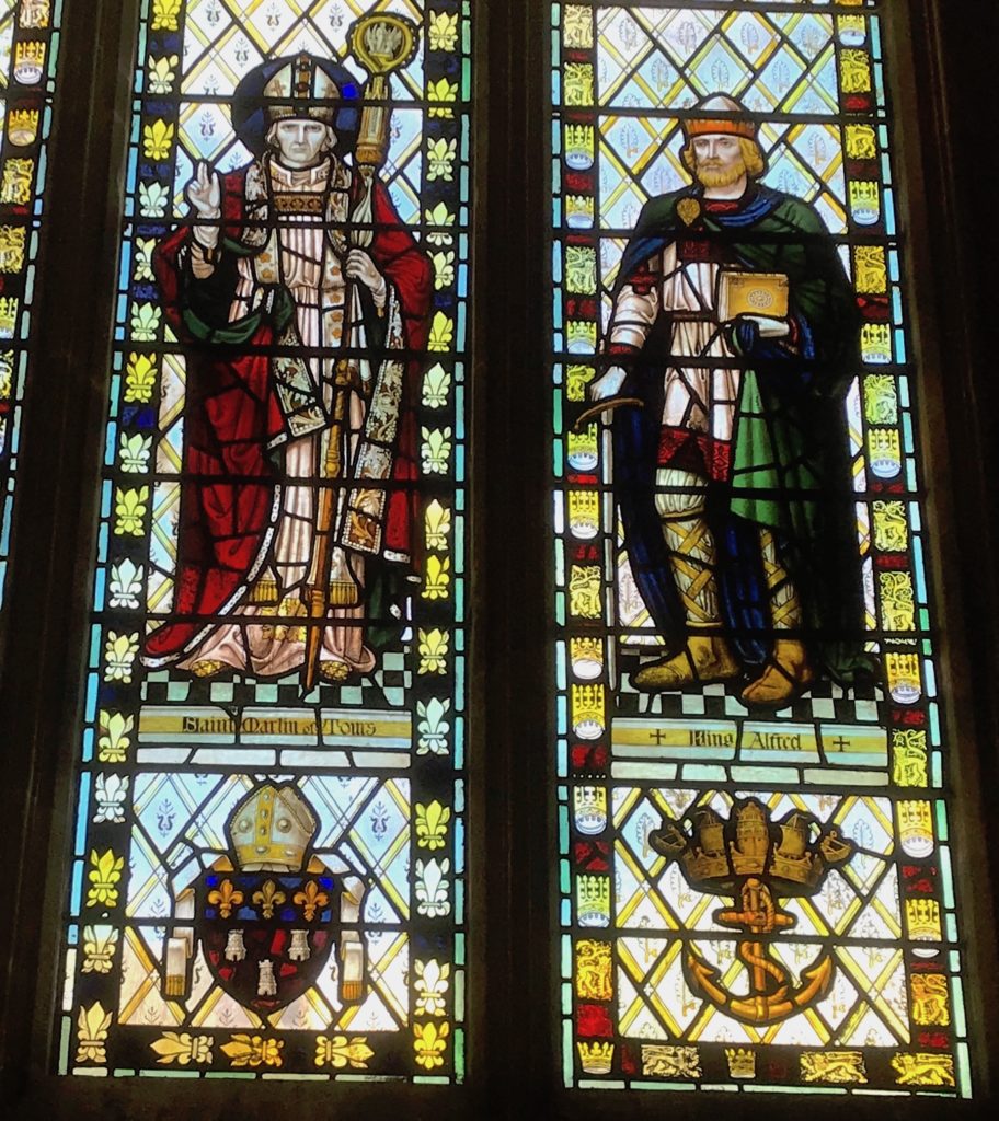 Wells cathedral, Somerset. Stained glass window showing King Alfred the Great. St Martin of Tours is shown to the left
