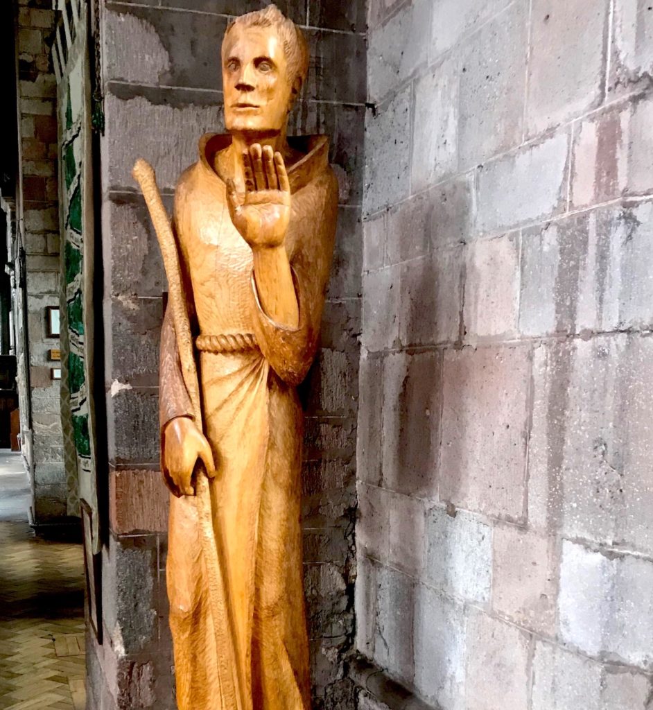A wood carving of St Boniface inside Crediton parish church