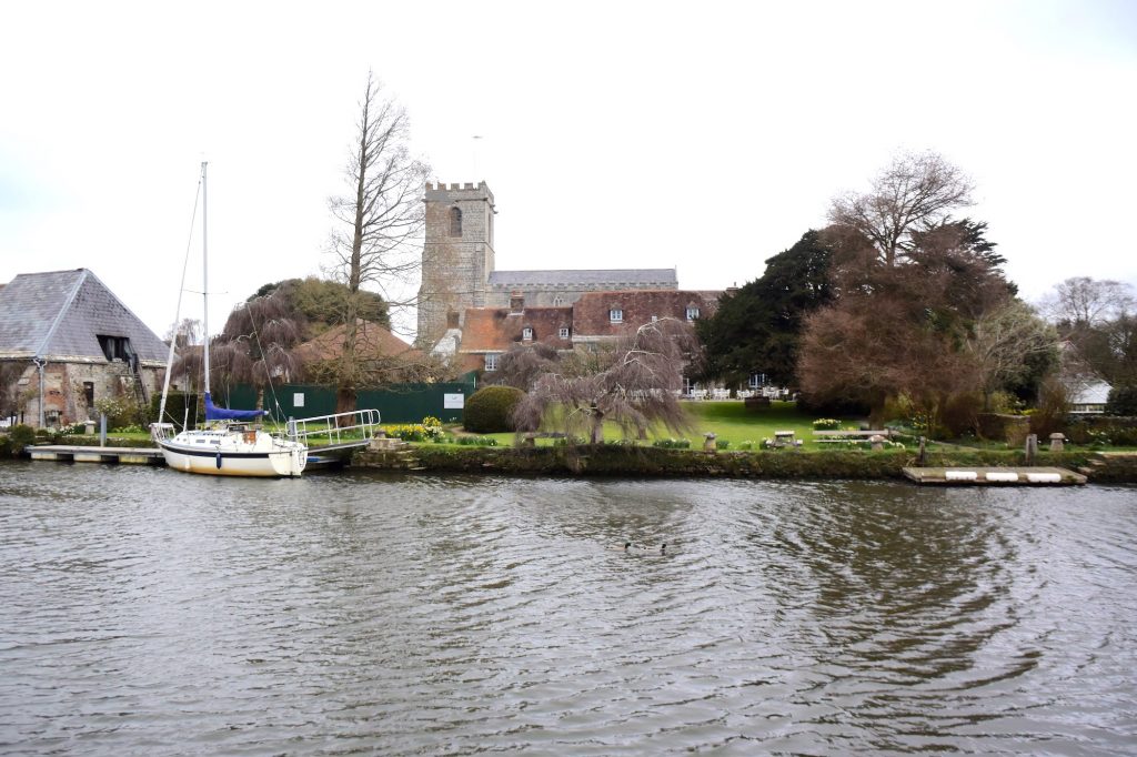 Wareham, the Purbecks, Dorset. A view of Lady St Mary's church from the south bank of the River Frome. Was this the heart of early to middle Saxon Wareham?